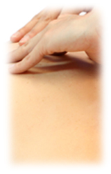 photo of hands massaging someone